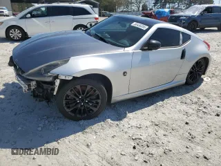 2009 Nissan 370Z Touring with VIN JN1AZ44E49M411367, listed as a Copart auction lot 50430355 with 74,909 mi miles and Salvage Title. Bid and sale history available at carsss.com. Image 1.