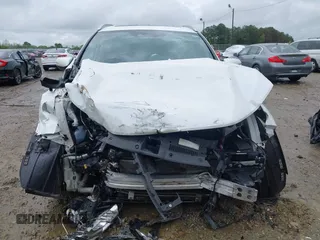 2018 Honda CR-V Touring z VIN 5J6RW1H96JL014087, wystawiony jako IAAI lot #41931640 z przebiegiem Nie podano mil oraz . Historia ofert i sprzedaży dostępna na DreamBid. Obrazek 13.