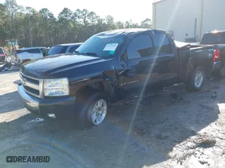 2007 Chevrolet Silverado 1500 LT w/1LT with VIN 2GCEK19J971628509, listed as a IAAI auction lot 41227422 with 303,725 mi miles. Bid and sale history available at carsss.com. Image 17.