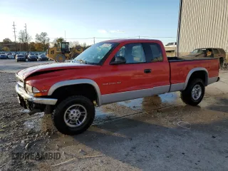 1997 Dodge Dakota z VIN 1B7GG23X0VS187346, wystawiony jako Copart lot #79128194 z przebiegiem 116 778 mil mil oraz Szkoda całkowita • Salvage title. Historia ofert i sprzedaży dostępna na DreamBid. Obrazek 1.