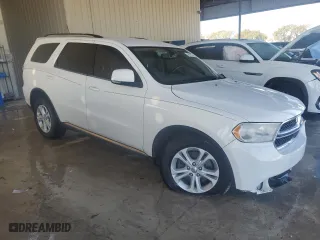 2012 Dodge Durango Crew with VIN 1C4SDHDT7CC253481, listed as a Copart auction lot 48611005 with 104,226 mi miles and Salvage Title. Bid and sale history available at carsss.com. Image 4.