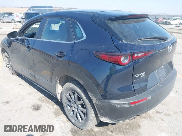 2023 Mazda CX-30 S with VIN 3MVDMBAM6PM579780, listed as a IAAI auction lot 41780720 with 32,603 mi miles and . Bid and sale history available at DreamBid. Image 3.