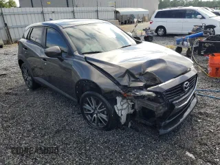 2017 Mazda CX-3 Touring z VIN JM1DKDC71H0172044, wystawiony jako Copart lot #56465125 z przebiegiem 119 374 mil mil oraz Szkoda całkowita • Salvage title. Historia ofert i sprzedaży dostępna na DreamBid. Obrazek 4.