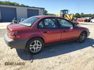 1998 Saturn SL z VIN 1G8ZH528XWZ144301, wystawiony jako Copart lot #75918414 z przebiegiem 219 256 mil mil oraz Szkoda całkowita • Salvage title. Historia ofert i sprzedaży dostępna na DreamBid. Obrazek 3.