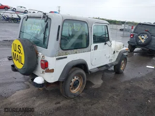 1990 Jeep Wrangler with VIN 2J4FY29T6LJ523487, listed as a IAAI auction lot 42008870 with 88,619 mi miles. Bid and sale history available at carsss.com. Image 4.