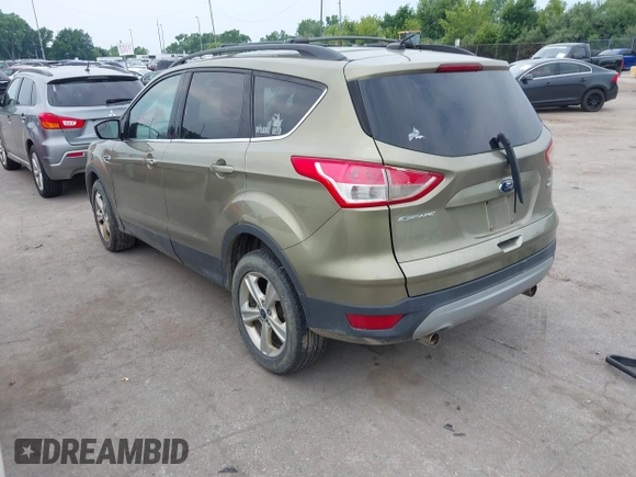 2013 Ford Escape SE with VIN 1FMCU9GX2DUC43098, listed as a IAAI auction lot 42687520 with 104,084 mi miles and . Bid and sale history available at DreamBid. Image 3.