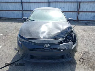 2023 Toyota Corolla LE with VIN 5YFB4MDE7PP028548, listed as a IAAI auction lot 41810081 with 34,352 mi miles and . Bid and sale history available at DreamBid. Image 12.