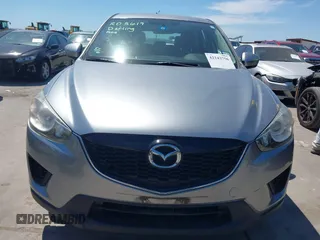 2014 Mazda CX-5 Sport with VIN JM3KE2BE7E0371203, listed as a IAAI auction lot 42243756 with 121,534 mi miles and . Bid and sale history available at DreamBid. Image 13.
