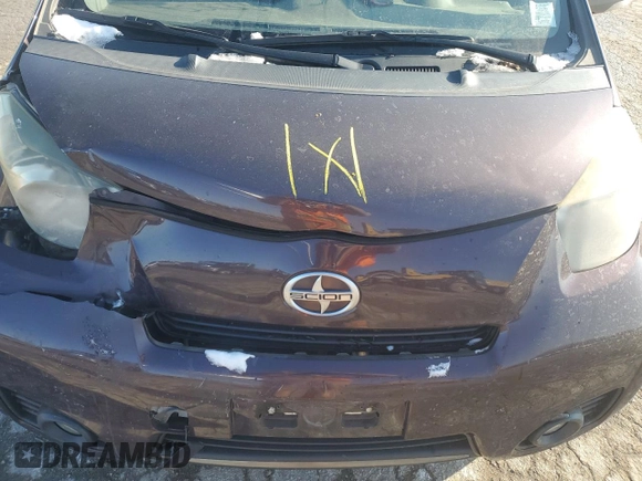 2012 Scion iQ z VIN JTNJJXB00CJ014966, wystawiony jako Copart lot #83100954 z przebiegiem 100 775 mil mil oraz Szkoda całkowita • Salvage title. Historia ofert i sprzedaży dostępna na DreamBid. Obrazek 12.