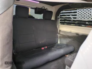 2007 Jeep Wrangler Rubicon z VIN 1J8GA64157L125319, wystawiony jako Copart lot #82929184 z przebiegiem 82 019 mil mil oraz Szkoda całkowita • Salvage title. Historia ofert i sprzedaży dostępna na DreamBid. Obrazek 10.