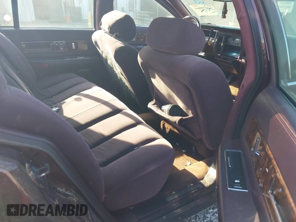 1996 Cadillac Fleetwood z VIN 1G6DW52PXTR713787, wystawiony jako IAAI lot #42079864 z przebiegiem Nie podano mil oraz . Historia ofert i sprzedaży dostępna na DreamBid. Obrazek 8.