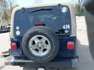 2000 Jeep Wrangler Sport with VIN 1J4FA49S5YP750123, listed as a IAAI auction lot 42060009 with Not Provided miles. Bid and sale history available at carsss.com. Image 16.