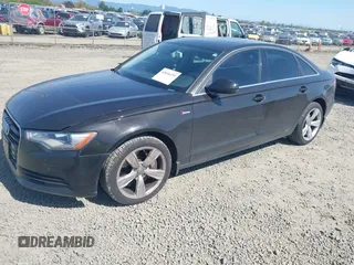 2012 Audi A6 3.0T Premium Plus with VIN WAUGGAFC3CN075992, listed as a IAAI auction lot 42036155 with 183,986 mi miles. Bid and sale history available at carsss.com. Image 2.
