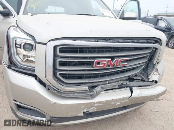 2015 GMC Yukon XL SLE z VIN 1GKS1GKC1FR155056, wystawiony jako IAAI lot #41517607 z przebiegiem 174 634 mil mil oraz . Historia ofert i sprzedaży dostępna na DreamBid. Obrazek 6.