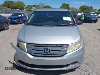 2012 Honda Odyssey Touring with VIN 5FNRL5H90CB099519, listed as a IAAI auction lot 41854550 with 185,110 mi miles. Bid and sale history available at carsss.com. Image 13.