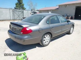 2003 Ford Taurus SEL Deluxe with VIN 1FAHP56SX3G103903, listed as a IAAI auction lot 42215781 with 185,042 mi miles and . Bid and sale history available at DreamBid. Image 4.