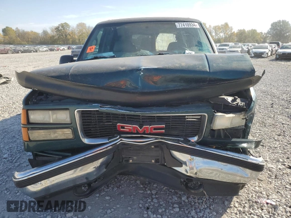 1997 GMC Suburban z VIN 3GKFK16R7VG514905, wystawiony jako Copart lot #77410934 z przebiegiem 193 116 mil mil oraz Szkoda całkowita • Salvage title. Historia ofert i sprzedaży dostępna na DreamBid. Obrazek 5.