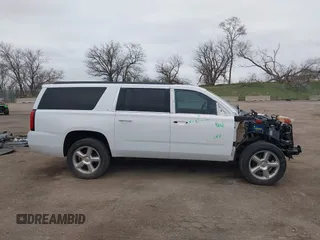 2015 Chevrolet Suburban LT with VIN 1GNSKJKC7FR547276, listed as a IAAI auction lot 42041289 with 189,075 mi miles and . Bid and sale history available at DreamBid. Image 14.