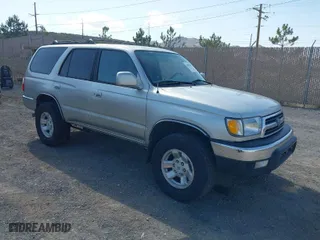 2000 Toyota 4Runner SR5 with VIN JT3HN86R5Y0287277, listed as a IAAI auction lot 41985408 with 275,462 mi miles. Bid and sale history available at carsss.com. Image 1.
