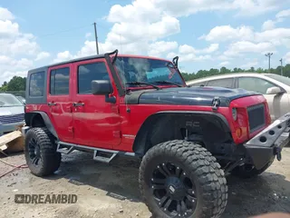 2007 Jeep Wrangler Unlimited X with VIN 1J4GA39107L187817, listed as a IAAI auction lot 42552732 with 149,702 mi miles and . Bid and sale history available at DreamBid. Image 13.