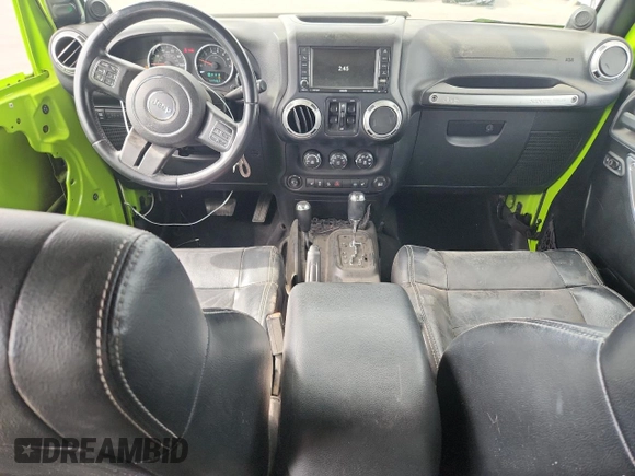 2012 Jeep Wrangler Unlimited Call of Duty MW3 z VIN 1C4BJWFG4CL242211, wystawiony jako Copart lot #59774555 z przebiegiem 117 463 mil mil oraz Szkoda całkowita • Salvage title. Historia ofert i sprzedaży dostępna na DreamBid. Obrazek 8.