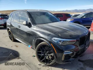 2021 BMW X5 M50i with VIN 5UXJU4C01M9F13949, listed as a Copart auction lot 84485564 with 0 mi miles and Salvage Title. Bid and sale history available at carsss.com. Image 4.