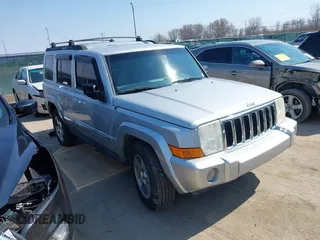 2010 Jeep Commander Sport with VIN 1J4RG4GK2AC105232, listed as a IAAI auction lot 41790011 with 192,281 mi miles. Bid and sale history available at carsss.com. Image 1.
