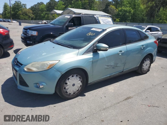 2012 Ford Focus SE with VIN 1FAHP3F29CL428201, listed as a Copart auction lot 52566905 with 209,909 mi miles and Salvage title. Bid and sale history available at DreamBid. Image 1.