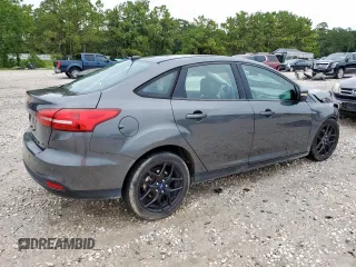 2016 Ford Focus SE with VIN 1FADP3F24GL407339, listed as a Copart auction lot 60744875 with 126,073 mi miles and Salvage title. Bid and sale history available at DreamBid. Image 3.