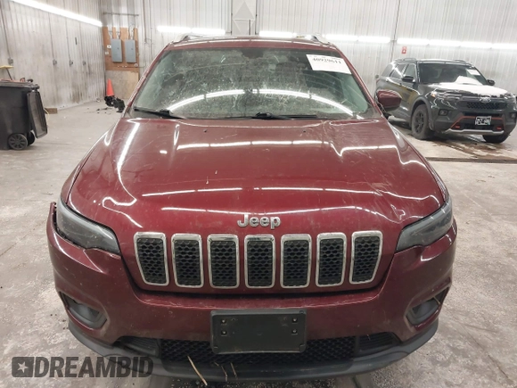 2019 Jeep Cherokee Latitude Plus with VIN 1C4PJMLX0KD185576, listed as a IAAI auction lot 40929611 with 105,546 mi miles and . Bid and sale history available at DreamBid. Image 13.