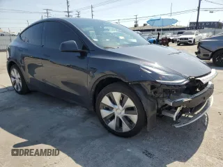 2024 Tesla Model Y Long Range z VIN 7SAYGDEE0RF024326, wystawiony jako Copart lot #52149675 z przebiegiem 34 503 mil mil oraz Szkoda całkowita • Salvage title. Historia ofert i sprzedaży dostępna na DreamBid. Obrazek 4.