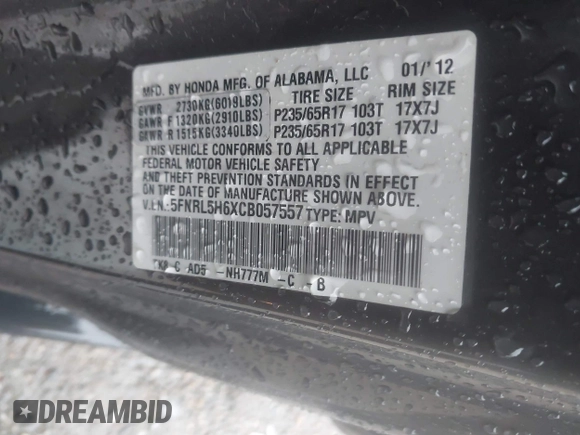 2012 Honda Odyssey EX-L with VIN 5FNRL5H6XCB057557, listed as a IAAI auction lot 42022410 with 174,286 mi miles and . Bid and sale history available at DreamBid. Image 9.