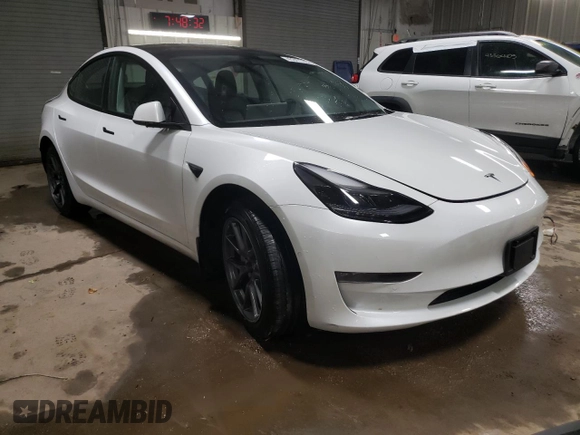 2022 Tesla Model 3 Long Range with VIN 5YJ3E1EB5NF334516, listed as a Copart auction lot 43247755 with 23,412 mi miles and Salvage Title. Bid and sale history available at DreamBid. Image 4.