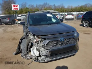 2021 Toyota RAV4 Hybrid XSE with VIN 2T3E6RFV0MW006815, listed as a IAAI auction lot 41796912 with 90,992 mi miles. Bid and sale history available at carsss.com. Image 1.