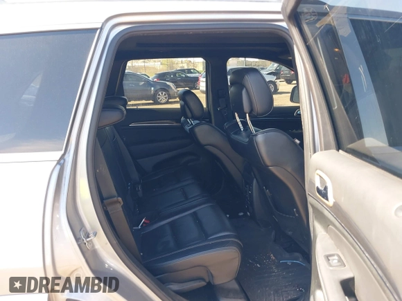 2014 Jeep Grand Cherokee Overland with VIN 1C4RJFCT9EC231840, listed as a IAAI auction lot 42114284 with 170,691 mi miles and . Bid and sale history available at DreamBid. Image 8.