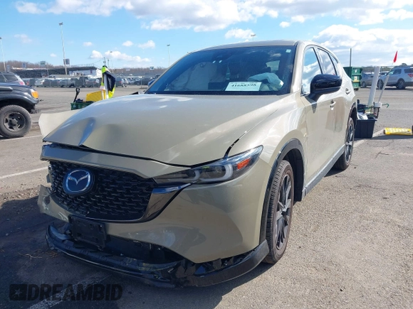 2024 Mazda CX-5 Carbon Edition with VIN JM3KFBAYXR0371954, listed as a IAAI auction lot 41688598 with 13,230 mi miles and . Bid and sale history available at DreamBid. Image 2.
