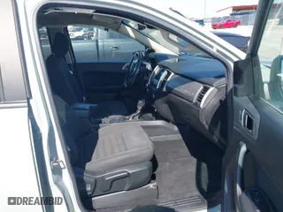 2022 Ford Ranger XL with VIN 1FTER4FH7NLD05727, listed as a IAAI auction lot 41567153 with 57,467 mi miles. Bid and sale history available at carsss.com. Image 5.