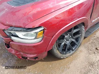 2022 Ram 1500 Laramie z VIN 1C6SRFJT0NN333200, wystawiony jako IAAI lot #42217219 z przebiegiem 27 332 mil mil oraz . Historia ofert i sprzedaży dostępna na DreamBid. Obrazek 6.