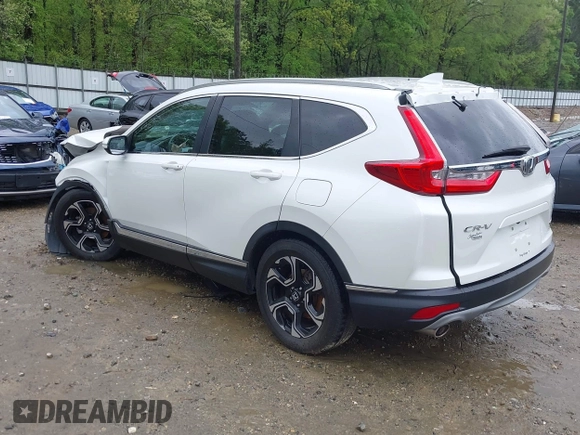 2018 Honda CR-V Touring z VIN 5J6RW1H96JL014087, wystawiony jako IAAI lot #41931640 z przebiegiem Nie podano mil oraz . Historia ofert i sprzedaży dostępna na DreamBid. Obrazek 3.