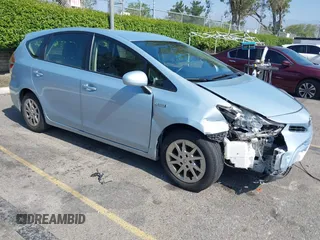2015 Toyota Prius Two z VIN JTDZN3EUXFJ027618, wystawiony jako IAAI lot #42203389 z przebiegiem 97 278 mil mil oraz . Historia ofert i sprzedaży dostępna na DreamBid. Obrazek 1.