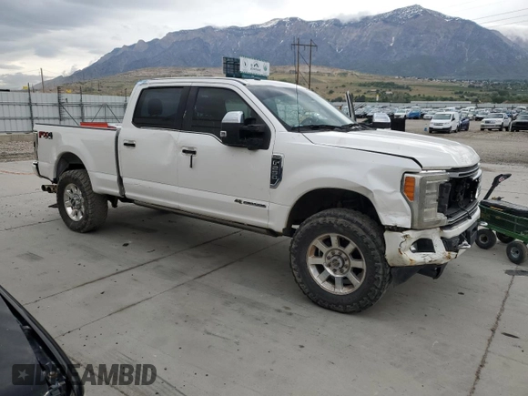 2017 Ford F-250 Lariat with VIN 1FT7W2BT6HED83358, listed as a Copart auction lot 55566865 with 140,578 mi miles and Salvage title. Bid and sale history available at DreamBid. Image 4.