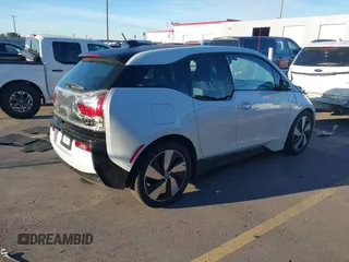 2015 BMW i3 z VIN WBY1Z4C52FV503063, wystawiony jako IAAI lot #40644359 z przebiegiem 77 009 mil mil oraz . Historia ofert i sprzedaży dostępna na DreamBid. Obrazek 4.