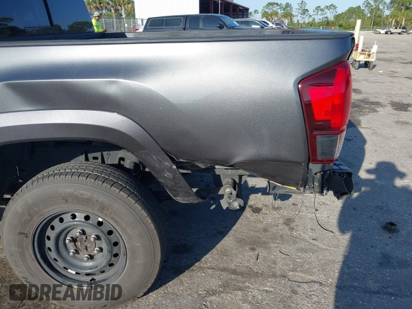 2018 Toyota Tacoma SR5 with VIN 3TMAZ5CN4JM069965, listed as a IAAI auction lot 41798238 with 124,619 mi miles and . Bid and sale history available at DreamBid. Image 6.