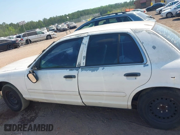 2001 Ford Crown Victoria Police Interceptor z VIN 2FAFP71W21X165218, wystawiony jako IAAI lot #42062199 z przebiegiem 233 978 mil mil oraz . Historia ofert i sprzedaży dostępna na DreamBid. Obrazek 14.