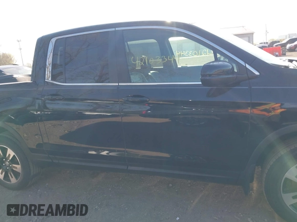 2020 Honda Ridgeline RTL with VIN 5FPYK3F52LB024816, listed as a IAAI auction lot 42103344 with 68,700 mi miles and . Bid and sale history available at DreamBid. Image 13.