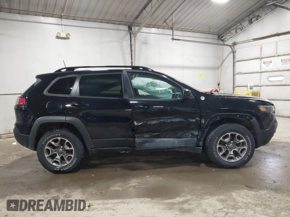 2022 Jeep Cherokee Trailhawk with VIN 1C4PJMBX8ND517236, listed as a IAAI auction lot 41530369 with 34,164 mi miles and . Bid and sale history available at DreamBid. Image 13.