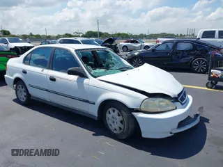 1998 Honda Civic LX z VIN 2HGEJ6678WH611765, wystawiony jako IAAI lot #42292351 z przebiegiem 177 501 mil mil oraz . Historia ofert i sprzedaży dostępna na DreamBid. Obrazek 1.