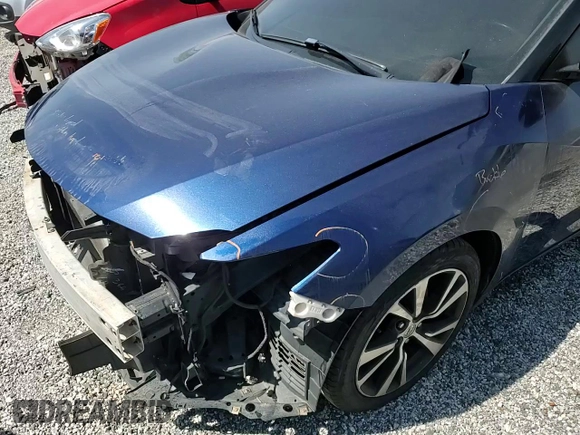 2017 Nissan Maxima SV with VIN 1N4AA6APXHC453803, listed as a Copart auction lot 52447455 with 132,270 mi miles and Salvage title. Bid and sale history available at DreamBid. Image 11.