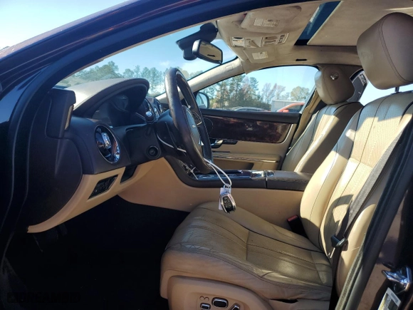 2011 Jaguar XJ with VIN SAJWA2GB7BLV06213, listed as a Copart auction lot 82365024 with NaN miles and Salvage Title. Bid and sale history available at carsss.com. Image 7.