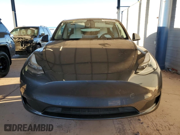 2021 Tesla Model Y Long Range with VIN 5YJYGDEEXMF151557, listed as a Copart auction lot 54936885 with 106,411 mi miles and Salvage Title. Bid and sale history available at DreamBid. Image 5.